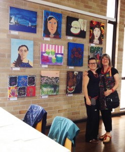 two women at an exhibition